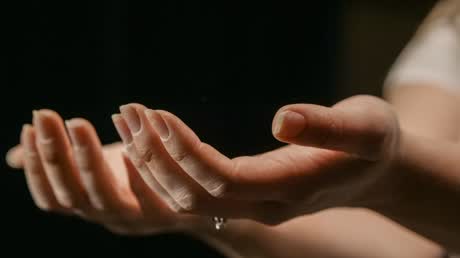 Hands held in prayer